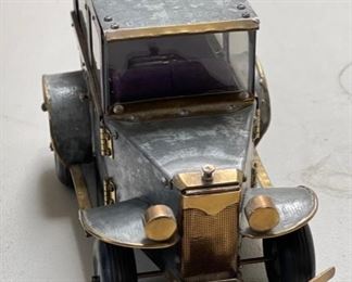 1970s Metal Copper & Brass Folk Art Sedan Car #3	7 x 6 x 12	HxWxD
