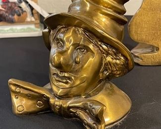2 Bronze Clown Head  Sculpture’s	1)5x4x5.5 inches. 2) 4.5x3.5x5.5 inches	
