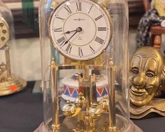 Howard Miller dome clock Germany Dual chime	12 inches Tall 7.25 inches in diameter	
