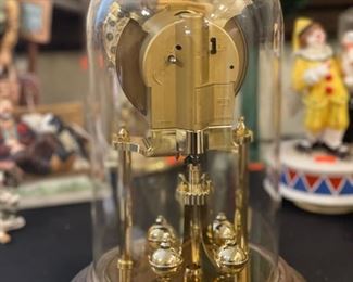 Howard Miller dome clock Germany Dual chime	12 inches Tall 7.25 inches in diameter	
