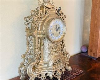 2___$150
German mantel clock, iron painted gold
• 24high 15 wide 7deep