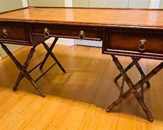 42___$450 Campaign faux bamboo desk made by PTMC (Pacific Traders Manufacturing Corp B.1973)
• 31high 61wide 28deep