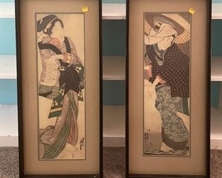 Matched pair Oriental framed art.
