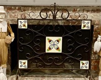 Wrought iron and ceramic tile fireplace screen