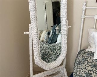 Wicker mirror on stand