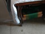 Showing leg of table.