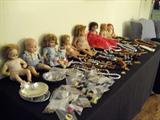 dolls and costume jewelry.  Dolls include a Shirley Temple doll.