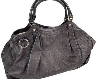 Lot 005
Gucci 'Sukey' Guccisima Dark Brown Leather Handbag.    https://www.bidoneverything.com/Event/LotDetails/109859820/Gucci-Sukey-Guccisima-Dark-Brown-Leather-Handbag