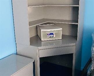 Corner gray Formica desk and bookcase