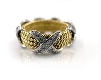 Lot 002
Tiffany & Co. "Rope Four-Row X" Ring.   https://www.bidoneverything.com/Event/LotDetails/109897252/Tiffany-Co-Rope-FourRow-X-Ring