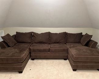 Sectional Sofa, may be separated into to chaises and a love seat. Easy Clean up fabric'