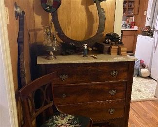 Antique dresser with marble. Needs a little TLC. Includes mirror 