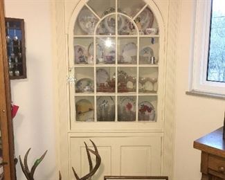 We have 2 built in corner cabinets for sale