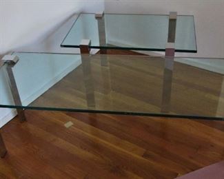 Contemporary glass tables with chrome leg