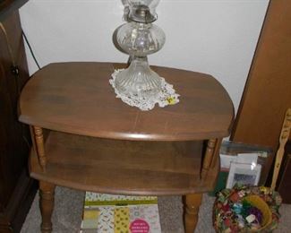 hurricane lamp / side table / several books of decorator paper