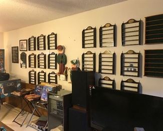 Wall display racks for golf balls or small collectibles 