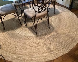 HIGH END KESSLER TRIPLE BEVELLED GLASS TOP AND HEAVY IRON BASE TABLE W/4 CHAIRS. 8 FT ROUND SISAL RUG