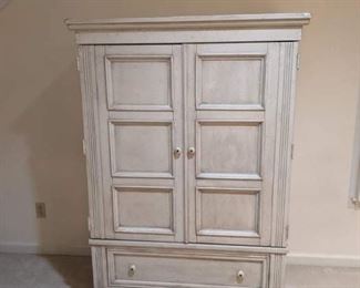 NICE ENTERTAINMENT CENTER OR CAN BE REPURPOSED INTO A STORAGE CABINET