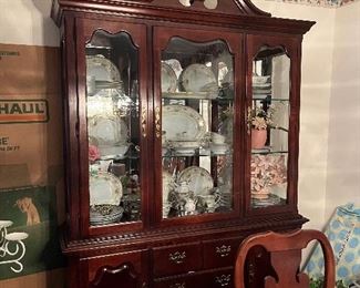 Traditional lighted hutch to showcase your beautiful China.  There is a matching table as well. 