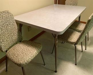 vintage Brody kitchen table & 5 chairs.  Has one additional leaf
