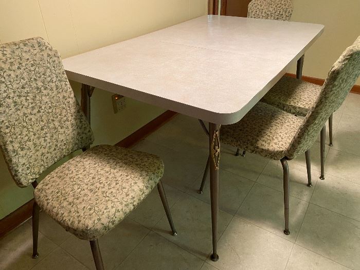 vintage Brody kitchen table & 5 chairs.  Has one additional leaf