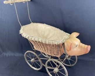 For your consideration is this Antique Pig Stroller, Wood & Wicker.  Wow! Unique antique family heirloom piece.  This type of chalk paint dates pre-50s but we aren't sure of exact age.  Highly collectible piece!