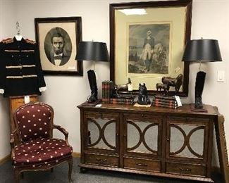 CONSOLE WITH MIRRORS, GRAET LEATHER BOOT LAMPS, GEORGE WASHINGTON SOLD LINCOLN STILL AVAILABLE. FRECH CHAIR IN BURGUNDY WITH GOLD STARS UPHOLSTERY, HORSE STATUE