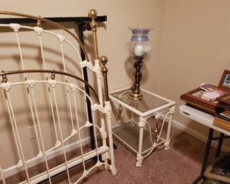 This iron and brass bedroom set is the real deal. The headboard and footboard probably weigh 50 pounds each.