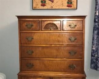 Beautifully crafted 1960's Tiger Maple Chest on Frame (one piece) in the Chippendale style with two fan carved drawers. Bears NYC company name.
