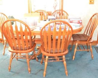Oak kitchen dinette set.  6 chairs.  Ceramic tile top.  