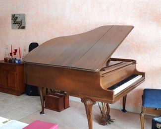 Baby grand piano, 60" long and 60" wide 