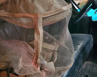 Beekeepers vintage hat and screen, possibly worn during a drive to stay dust.