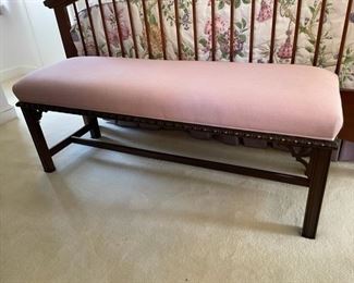 $250   BEAUTIFUL HARDWOOD BENCH WITH EXTENSIVE CARVING AND PINK UPHOLSTERY

 WHY WE LOVE IT:

The contrast of the pink upholstery against the dark wood of this bench is gorgeous.  Asian inspired leg brackets and modified rope carving on the skirt.

 DETAILS + DIMENSIONS:

48L X 15D X 17.5T 
                                                                                            
 CONDITION: This vintage piece is in very good pre owned condition.  There are minor superficial signs of wear to be expected with use and age.  Please refer to photos for a more detailed look at condition.  We make every attempt to list and photograph any defects or signs of wear that are significant to this sale. 

LOCAL PICK UP ALEXANDRIA, VA.  BUYER IS RESPONSIBLE FOR ANY NECESSARY DISASSEMBLY AND ALL COSTS ASSOCIATED WITH SHIPPING OR PICK UP.  CONTACT US FOR SHIPPING RECOMMENDATIONS.