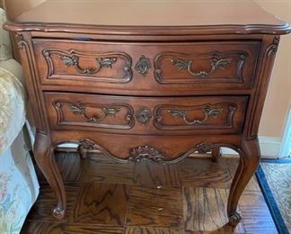 $300  HICKORY CHAIR FRENCH COUNTRY COLLECTION 2 DRAWER ENTRY TABLE

 WHY WE LOVE IT:

Elevated by carved cabriole legs, this small cherry chest features hand-carved posts, aprons and drawer fronts.  brass hardware accents the two drawers and an asymmetrical carved shell adorns the serpentine front rail.  Historically inspired with exceptional details such as  scalloped apron and carved accents giving this chest a French Country charm. This lovely piece would be fabulous in an Entry Hall with a mirror above it, in a bedroom for extra storage or as an accent piece in a living room. Where ever you choose to place it this chest of drawers will make a statement.

 DETAILS + DIMENSIONS:

30 1/4w X 18d X 30H 
original price $2145
 
CONDITION: A pre owned vintage piece that has been extremely well cared for and in very good condition.  There may be minor signs of wear commensurate of age and use.  Please refer to photos for a more detailed look at condition.  We make every attempt to list and 