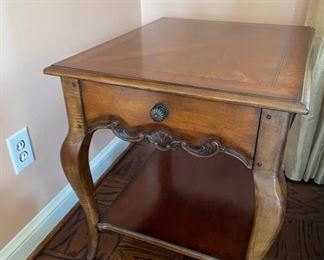 $350   DREXEL HERITAGE CARVED SINGLE DRAWER SIDE TABLE/NIGHTSTAND WITH CABRIOLE LEGS

 WHY WE LOVE IT:

We love the elegant curves and shape of this piece.  A curved apron that holds a single drawer and the black an gold top inlay border add beautiful detail to the piece.  Plenty of storage with the single drawer and lower shelf.  It is a great piece that does not take up a lot of space in the room.

 DETAILS + DIMENSIONS:

 23W X 28D X 26H inches
CONDITION: This is a vintage piece that has been well cared for and is in very good condition.  There may be signs of minor superficial wear commensurate with age and use.  Please refer to photos for a more detailed look at condition.  We make every attempt to list and photograph any defects or signs of wear that are significant to this sale. 

 

LOCAL PICK UP ALEXANDRIA, VA.  BUYER IS RESPONSIBLE FOR ANY NECESSARY DISASSEMBLY AND ALL COSTS ASSOCIATED WITH SHIPPING OR PICK UP.  CONTACT US FOR SHIPPING RECOMMENDATIONS.