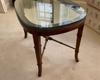 $350  OLDE SAVANNAH WOODEN OCCASIONAL GLASSTOP TABLE WITH CROSS BRACES

 WHY WE LOVE IT:

We are loving the nautical feel of this table.  The delicate cross bracing in the wood base matched with the heavy glass top created dimension and interest in this piece. It is a great size for a smaller room.

 DETAILS + DIMENSIONS:

 28W X 20D X 20H inches
 

CONDITION: This piece is in good pre owned condition.  There are minor superficial signs of wear to be expected with use and age.  Please refer to photos for a more detailed look at condition.  We make every attempt to list and photograph any defects or signs of wear that are significant to this sale. 

 

LOCAL PICK UP ALEXANDRIA, VA.  BUYER IS RESPONSIBLE FOR ANY NECESSARY DISASSEMBLY AND ALL COSTS ASSOCIATED WITH SHIPPING OR PICK UP.  CONTACT US FOR SHIPPING RECOMMENDATIONS.