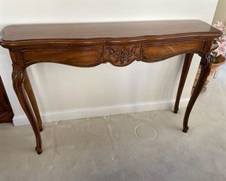 $350  THOMASVILLE FURNITURE FRENCH FOYER CONSOLE TABLE WITH CABRIOLE LEGS

 WHY WE LOVE IT:

Great shape tight and sturdy.  Minor wear. Please see photos as they are considered part of the description. Thomasville French carved sofa hall foyer table console regency. 

 DETAILS + DIMENSIONS:
 48L X 12.5D X 29H inches
 
CONDITION: This piece is in good pre owned condition.  There are minor superficial signs of wear to be expected with use and age.  Please refer to photos for a more detailed look at condition.  We make every attempt to list and photograph any defects or signs of wear that are significant to this sale. 

LOCAL PICK UP ALEXANDRIA, VA.  BUYER IS RESPONSIBLE FOR ANY NECESSARY DISASSEMBLY AND ALL COSTS ASSOCIATED WITH SHIPPING OR PICK UP.  CONTACT US FOR SHIPPING RECOMMENDATIONS.
