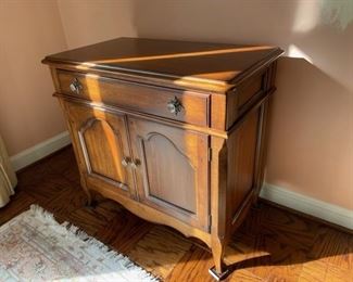$300     HICKORY WHITE MID CENTURY SERVER/BUFFET/SIDEBOARD

 WHY WE LOVE IT:

Hickory White Mid Century Server/Buffet/Sideboard.  This multi functional piece is a great addition to a front entry, hallway, or dining space. Raised panels on the front and sides with extensively detailed knobs with matching escutcheons. Interior lower shelf for organized storage.  Door includes details of serpentine and wood pins.

 DETAILS + DIMENSIONS:

Hazel Finish
35.5w X 20d X 33h INCHES
#135-72-10
 

CONDITION: This piece is in very good condition.  There are no scratches or imperfections in the mirror or metal.  Please refer to photos for a more detailed look at condition.  We make every attempt to list and photograph any defects or signs of wear that are significant to this sale. 

 

LOCAL PICK UP ALEXANDRIA, VA.  BUYER IS RESPONSIBLE FOR ANY NECESSARY DISASSEMBLY AND ALL COSTS ASSOCIATED WITH SHIPPING OR PICK UP.  CONTACT US FOR SHIPPING RECOMMENDATIONS.