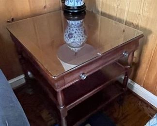 $350     SHERRILL CTH 3 TIERED DRAWER OCCASIONAL END TABLE
WHY WE LOVE IT:
A highly functional drawer end table finished all around and providing two lower shelves. Finished with antique brass hardware and glass top.
Original price $1580
DETAILS + DIMENSIONS:
26L X 27D X 26H inches
CONDITION: This piece is in very good condition.  There are no scratches or imperfections in the mirror or metal.  Please refer to photos for a more detailed look at condition.  We make every attempt to list and photograph any defects or signs of wear that are significant to this sale. 
LOCAL PICK UP ALEXANDRIA, VA.  BUYER IS RESPONSIBLE FOR ANY NECESSARY DISASSEMBLY AND ALL COSTS ASSOCIATED WITH SHIPPING OR PICK UP.  CONTACT US FOR SHIPPING RECOMMENDATIONS.