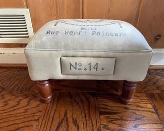 $100  INDIA'S HERITAGE INC RUE HENRI POINCARE FOOTSTOOL
WHY WE LOVE IT:
This great little stool adds a historic French influence to the room. A small but impactful decor statement that is a useful addition for extra seating or to sit back and put your feet up on.
DETAILS + DIMENSIONS:
17W X 11D X 12H
CONDITION: This piece is in very good condition.  There are no scratches or imperfections in the mirror or metal.  Please refer to photos for a more detailed look at condition.  We make every attempt to list and photograph any defects or signs of wear that are significant to this sale. 
LOCAL PICK UP ALEXANDRIA, VA.  BUYER IS RESPONSIBLE FOR ANY NECESSARY DISASSEMBLY AND ALL COSTS ASSOCIATED WITH SHIPPING OR PICK UP.  CONTACT US FOR SHIPPING RECOMMENDATIONS.