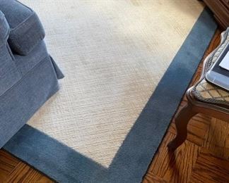 $250     TEXTURAL CREAM FIELD AREA RUG WITH A DENIM BLUE BORDER

 WHY WE LOVE IT:

This area rug has a cream embossed field that adds great texture to a room.  Finished with a denim blue border to give contrast and add color.   

 DETAILS + DIMENSIONS:

6 X 9 ft. 
 

CONDITION: This piece is in very good condition.  There are no scratches or imperfections in the mirror or metal.  Please refer to photos for a more detailed look at condition.  We make every attempt to list and photograph any defects or signs of wear that are significant to this sale. 

 

LOCAL PICK UP ALEXANDRIA, VA.  BUYER IS RESPONSIBLE FOR ANY NECESSARY DISASSEMBLY AND ALL COSTS ASSOCIATED WITH SHIPPING OR PICK UP.  CONTACT US FOR SHIPPING RECOMMENDATIONS.