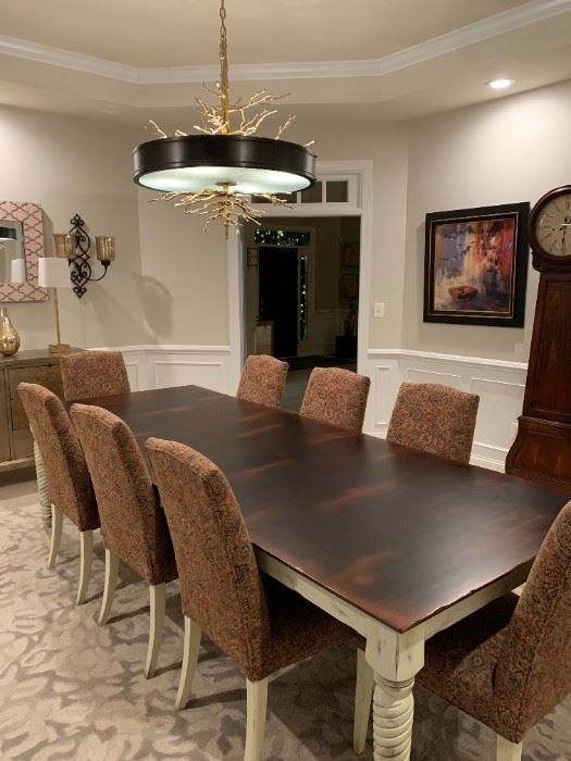 $3000 THIS SET IS IN LEESBURG, VA Custom Bassett Furniture French Country Twisted Leg Dining Table w/ 8 Upholstered Chairs
LOCATION:
Leesburg, VA.
WHY WE LOVE IT:
Beautiful Estate Size French Country Dining Table made by Basset Furniture Co. known for it's dedication to quality materials and construction. This table and chairs are custom made by a well known high end designer. Cream legs with a hand scratched surface make this table a great choice for a family with children. The chairs are an updated style with Kilim inspired geometric print upholstery in earth tone colors.
DETAILS + DIMENSIONS:
Hand Scratched Finish Walnut top
92 - 112 L x 44 W x 30 H inches (comes with one leaf)
Extra wide dining chairs
CONDITION: Like New. Used less than 5 times. This set is in excellent condition. Please refer to photos for a more detailed look at condition. We make every attempt to list and photograph any defects or signs of wear that are significant to this sale