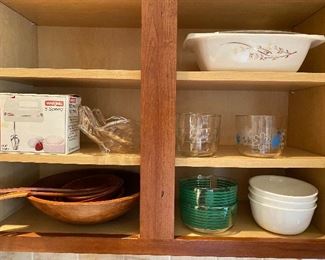 Kitchen with much quality cookware/dinnerware.