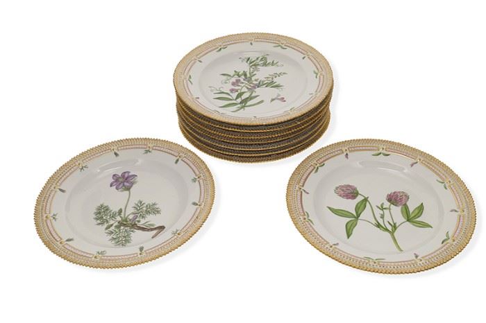 1001
A Royal Copenhagen "Flora Danica" Porcelain Dinner Service
1966
Each marked for Royal Copenhagen
Each porcelain dinner plate with a gilt rim centering various botanical motifs, 9 pieces
Each: 10.25" Dia. approximately
Estimate: $4,000 - $6,000