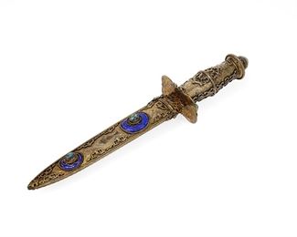 1040
A Viennese Enameled Gilt-Silver Presentation Dagger
20th Century
Appears unmarked
The enameled gilt-silver ceremonial dagger or letter opener set with semi-precious stones
11.75" H x 2.5" W x1.5" D
Estimate: $1,000 - $1,500