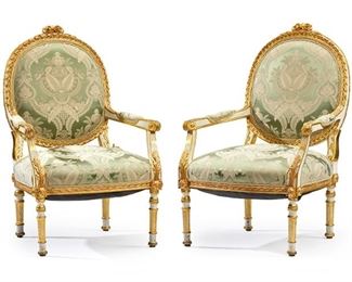 1047
A Pair Of Louis XVI-Style Carved Giltwood Armchairs
First-Quarter 20th Century
Each with parcel gilt and polychromed wood carcass with green silk damask upholstery, issuing an oval upholstered backrest with carved bead and spindle trim surmounted by a rose crest, over two scrolled arms with elbow pads and an upholstered seat raised on four fluted pole legs, 2 pieces
Each: 37" H x 28" W x 23" D
Estimate: $1,500 - $2,500