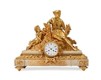 1093
A French Gilt-Bronze And Marble Mantel Clock
Late 19th/Early 20th Century
Dial marked illegibly, movement unmarked
The mantel clock with a white enameled dial, blue Roman numeral hour markers and outer minute track, and two train movement set in a gilt-bronze figural case surmounted by a Classical woman and putto raised on a marble base atop four feet
21" H x 26" W x 9.5" D
Estimate: $6,000 - $8,000