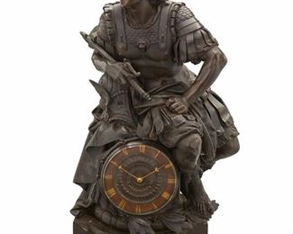 1101
A French Charpentier Figural Bronze Mantel Clock
Fourth-Quarter 19th Century
Movement signed: Charpentier Ft de Bronzes a Paris / 473
The clock with a patinated bronze dial with gilt Roman numeral hour markers and two train movement enclosed in a patinated bronze architectural column case surrounded by laurel branches and surmounted by a Greco-Roman warrior, raised overall on a pedestal base
26.75" H x 14" W x 12" D
Estimate: $3,000 - $5,000