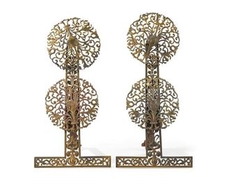 1105
A Pair Of French Art Nouveau Gilt-Bronze Chenets
Late 19th/Early 20th Century
Each gilt-bronze chenet with two openwork floral medallions on a conformingly designed support, 2 pieces
Each: 28" H x 14.75" W x 17" D
Estimate: $1,200 - $1,800