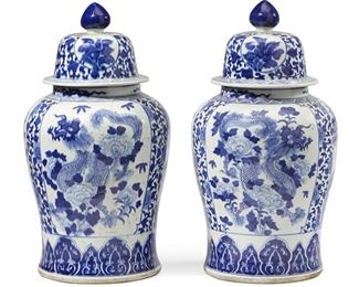 1112
A Pair Of Large Chinese Porcelain Ginger Jars
20th Century
Each large, lidded urn with blue underglaze floral, figural, and dragon motifs, 2 pieces
Each: 28" H x 14" Dia.
Estimate: $800 - $1,200
